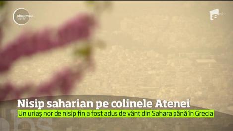 Un uriaş nor de nisip fin şi praf, adus de vânt tocmai din Sahara, a ajuns deasupra Greciei