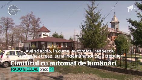 În numele Tatălui, al Fiului și-al Sfântului...  Tonomat! Aparat cu lumânări, în faţa unui cimitor din Prahova! Atenție, automatul nu dă rest