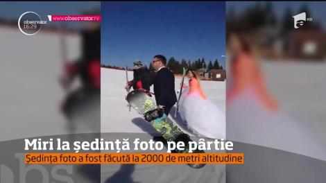 Ședință foto inedită! O mireasă pe schiuri s-a lăsat pozată la 2000 de metri altitudine, pe Transalpina: "Scoate berea că revenim!"
