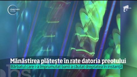 Mănăstirea plătește în rate datoria preotului. În comunitate se vorbeşte că întreaga sumă ar fi fost pierdută de monah la păcănele!