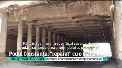 Podul Constanța, ”reparat” cu o mână de glet. CFR infrastructură a uns pilonii pentru ca betonul să nu mai cadă