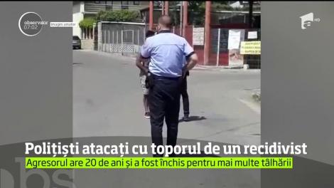 Un echipaj de poliţie din Roman, atacat cu toporul de către un individ