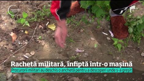 Alertă într-un cartier din Craiova, după ce în maşinile şi în curţile oamenilor au ajuns bucăţi din rachete militare!