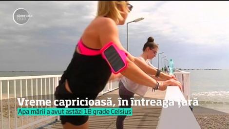 Vremea extremă a împărţit România în două. În timp ce unii au făcut plajă pe litoral, alţii au schiat pe grindină