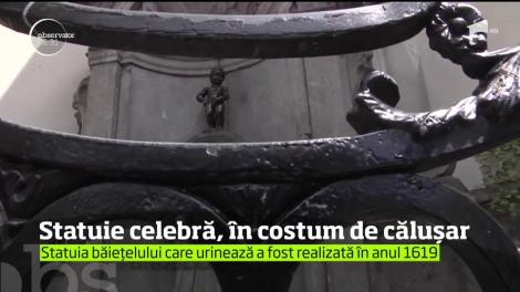 Statuia-simbol a oraşului Bruxelles a îmbrăcat costum de căluşar, de Ziua Costumului Popular Românesc.