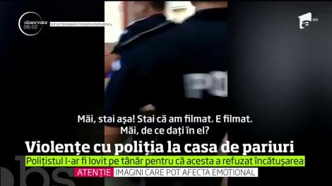 Imagini şocante surprinse la o Casă de Pariuri. Un tânăr a fost lovit de un poliţist care îl imobilizase pentru că nu ar fi vrut să coopereze