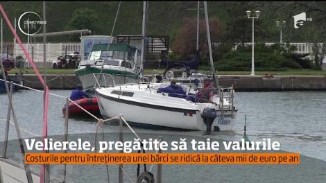 Velierele, pregătite să taie valurile. Înainte de prima ieșire pe mare din sezon, bărcile trebuie pregătite