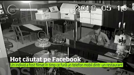 Hoţ căutat căutat pe Facebook. Individul a fost surprins de camerele de supraveghere ale unui restaurant din Oneşti când fură telefonul barmanului