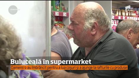 Primul supermarket deschis într-o comună din judeţul Dâmboviţa a fost invadat de localnicii dornici să plece acasă cu multe sacoşe, toate pline de oferte
