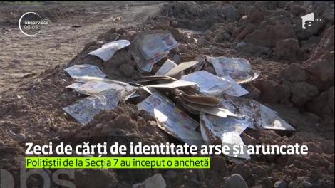 Zeci de cărti de identitate arse sau deteriorate parţial au fost găsite pe un teren viran din Capitală, lângă cartierul Pipera