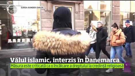 Parlamentul din Danemarca a adoptat o lege care interzice purtarea vălului islamic şi a altor piese vestimentare care acoperă feţele