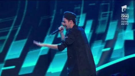 KIO are deja colaborări cu nume mari ale muzicii românești și vrea un scaun de-al celor 4. Va reuși, oare, să convingă jurații?! Vine să-l răzbune pe Fratele Lu Chan cu o rugăciune pe note