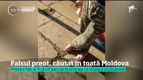Iartă-l, Doamne, că a dat de păcat! La păcănele, în haine preoțești. Bărbatul a fost filmat într-un local din Botoșani. A primit 20.000 de euro de la un credincios credul!