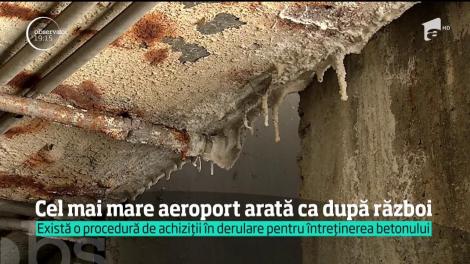 Pin de gropi, cel mai mare aeroport din România arată ca după război