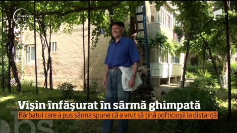 Și-a învelit vişinul în sârmă ghimpată, pentru ca nu cumva copiii să-i mănânce fructele!