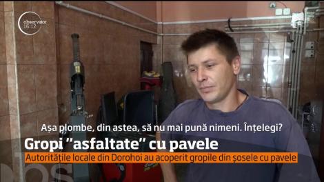 Edilii din Dorohoi cred că cea mai bună metodă ca să astupe cumva gropile de pe străzile oraşului este să le umple cu pavele