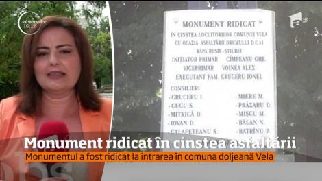 Monument ridicat în cinstea asfaltării. Crucea a fost ridicată la intrarea în comuna doljeană Vela