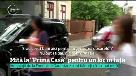 Scandalul "Mită pentru Prima Casă" a început cu zeci de percheziţii şi audieri! Procurorii acuză că funcţionarii cereau bani de la clienţi, ca să le dea credite mai repede