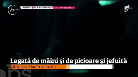 O femeie din Arad a fost legată de mâini și picioare și apoi jefuită