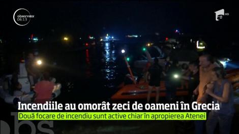 Cel puţin 20 de oameni au murit, iar peste o sută au fost răniţi în uriaşele incendii de vegetaţie care continuă în Grecia, lângă Atena