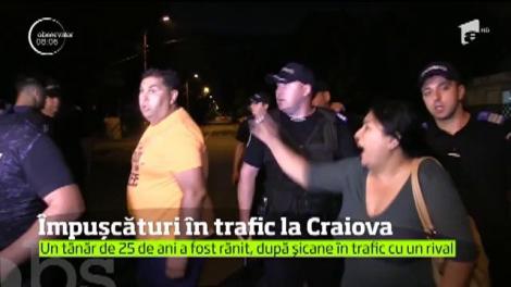 A fost scandal mare în Craiova. Împuşcături în trafic, bătaie cu sticle şi înjurături