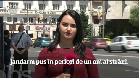 Jandarm pus în pericol de un om al străzii