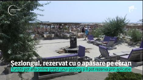 Şezlongul de pe plajă se poate rezerva cu o apăsare de ecran