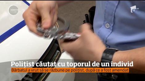 Polițist căutat cu toporul de un individ