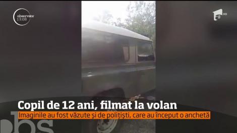 Un copil de 12 ani a fost filmat la volanul unei maşini de teren, pe o şosea din Maramureş. Isprava a ajuns în vizorul Poliţiei!