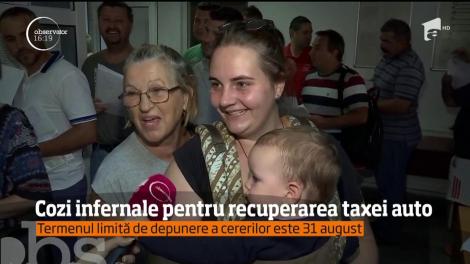 Cozi infernale pentru recuperarea taxei auto