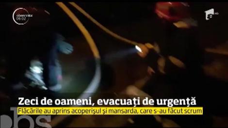 Incendiu extrem de  violent &icirc;n Capitală, doi pompieri răniți