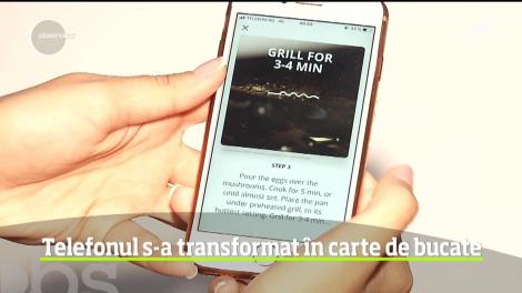 Românii nu renunţă la telefon nici măcar în bucătărie!