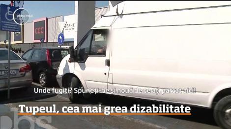 Locurile destinate persoanelor cu dizabilităţi, ocupate de şoferi cu tupeu