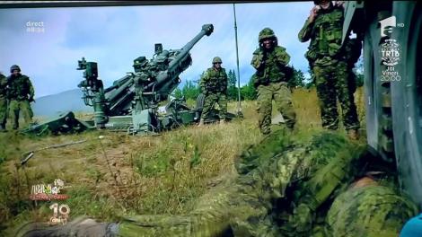 Smiley News. Glume militare: Un soldat este trezit cu tunul