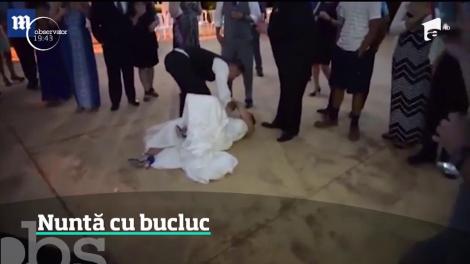 Nuntă cu bucluc. Mireasa se împiedică în rochie şi cade pe spate