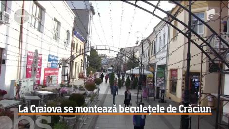 Crăciunul a venit mai devreme la Craiova! Edilii locali au început să monteze beculeţe multicolore prin oraş