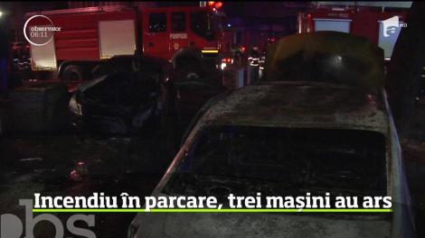 Incendiu de proporţii în parcarea unui bloc din Capitală