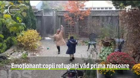 Momente pline de entuziasm pentru doi copii refugiați care au întâlnit prima ninsoare din viața lor. Imaginile te vor emoționa peste măsură