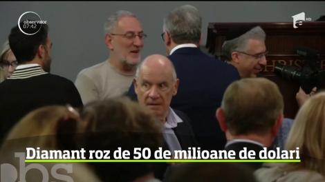 Un diamant roz de o calitate excepţională a fost vândut la licitaţie cu peste 50 de milioane de dolari, preţ care reprezintă un nou record