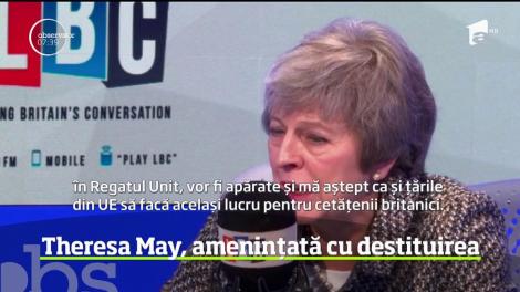 Theresa May, amenințată cu destituirea