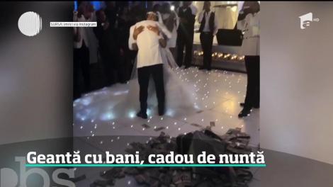 Un rapper din Georgia a devenit celebru în toată lumea, după ce a vărsat zeci de teancuri de bani în mijlocul un ring de dans