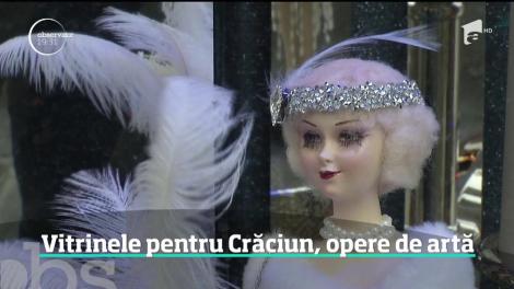 În aşteptarea Crăciunului, milioane de lumini şi ornamente sofisticate sclipesc în geamurile magazinelor din România
