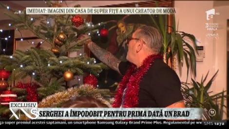 Serghei Mizil a împodobit bradul de Crăciun pentru prima dată
