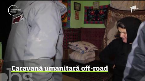 Zeci de kilometri străbătuţi pe vreme capricioasă, 70 de maşini de teren, 15 tone de alimente şi alte lucruri de strictă necesitate împărţite