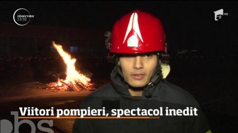 Viitorii pompieri, spectacol inedit în jurul focului