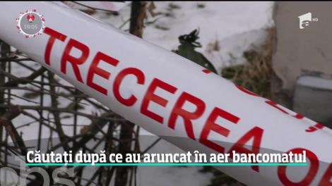 Cei trei indivizi care au aruncat în aer o bancă din Braşov sunt în continuare în libertate