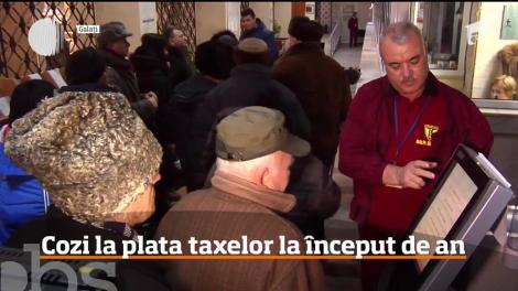 Cozi la plata taxelor, la început de an! Reducerea de care beneficiază românii care ajung la timp să achite