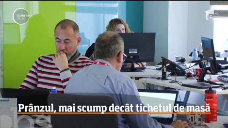 Prânzul, mai scump decât tichetul de masă