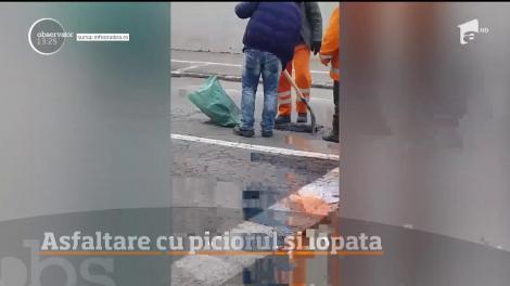 Scene de-a râsu' plânsu în Oradea! Trei angajaţi de la Drumuri Bihor au fost filmaţi în plină zi de un trecător, pe stradă în timp ce asfaltau cu piciorul şi lopata, în plină iarnă