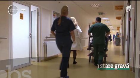 Victima împușcată dn greșeală de un polițist, în stare gravă la spital
